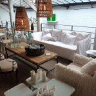 Washed linen, bamboo, natural lighting, fur and fragile porcelain products at Merci.